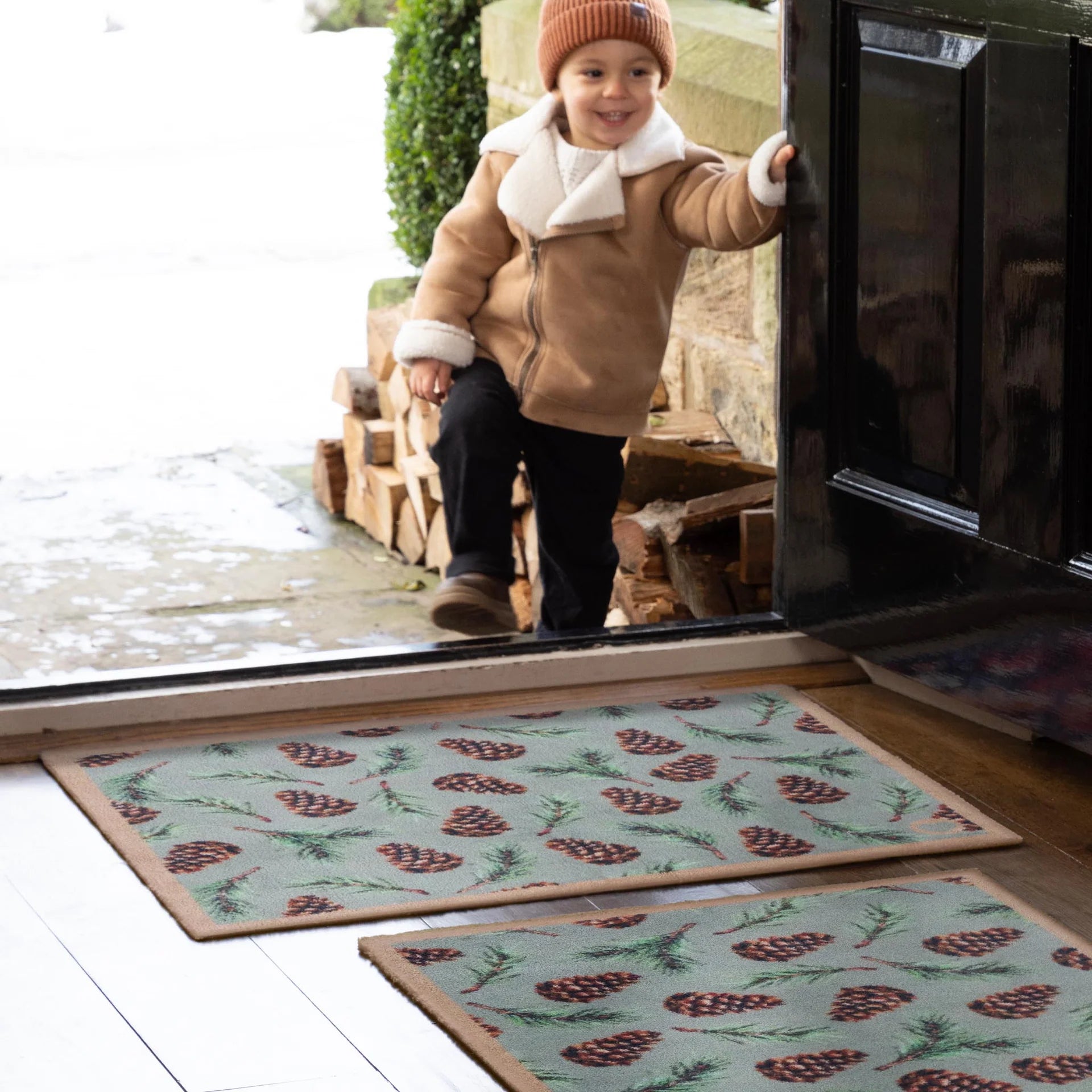 hug rug pinecones door mat and runner in hallway entrance