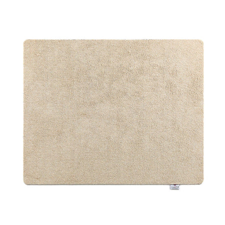 Beige rectangular mat on a white background