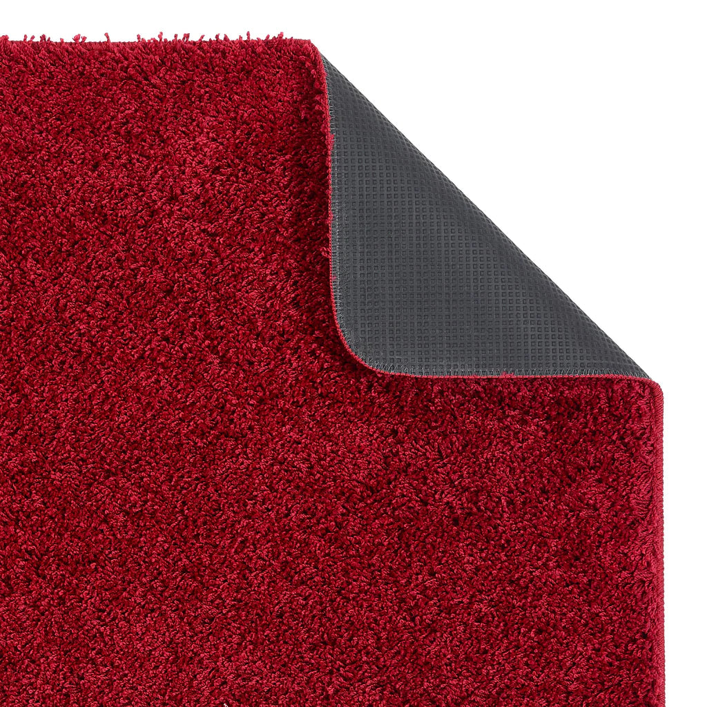 Red textured mat with a gray backing