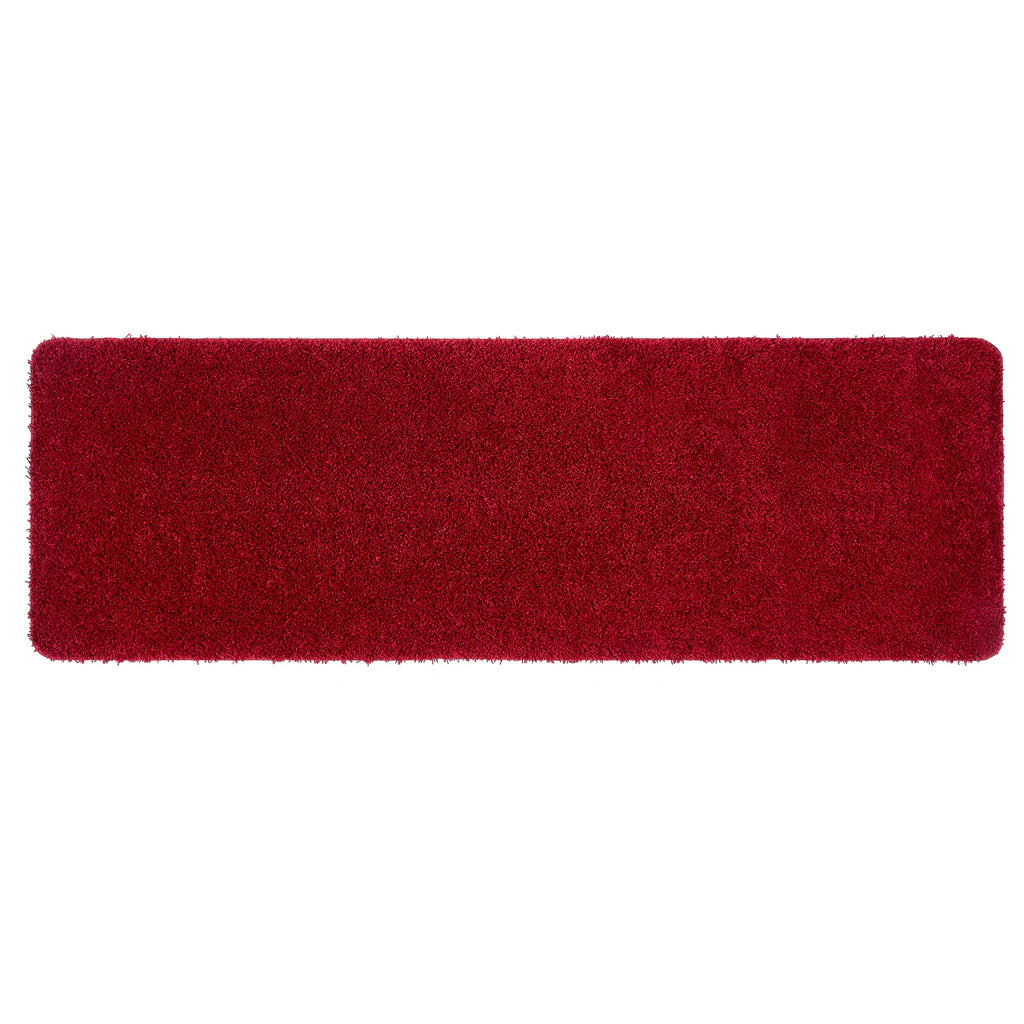 Red rectangular rug on a white background