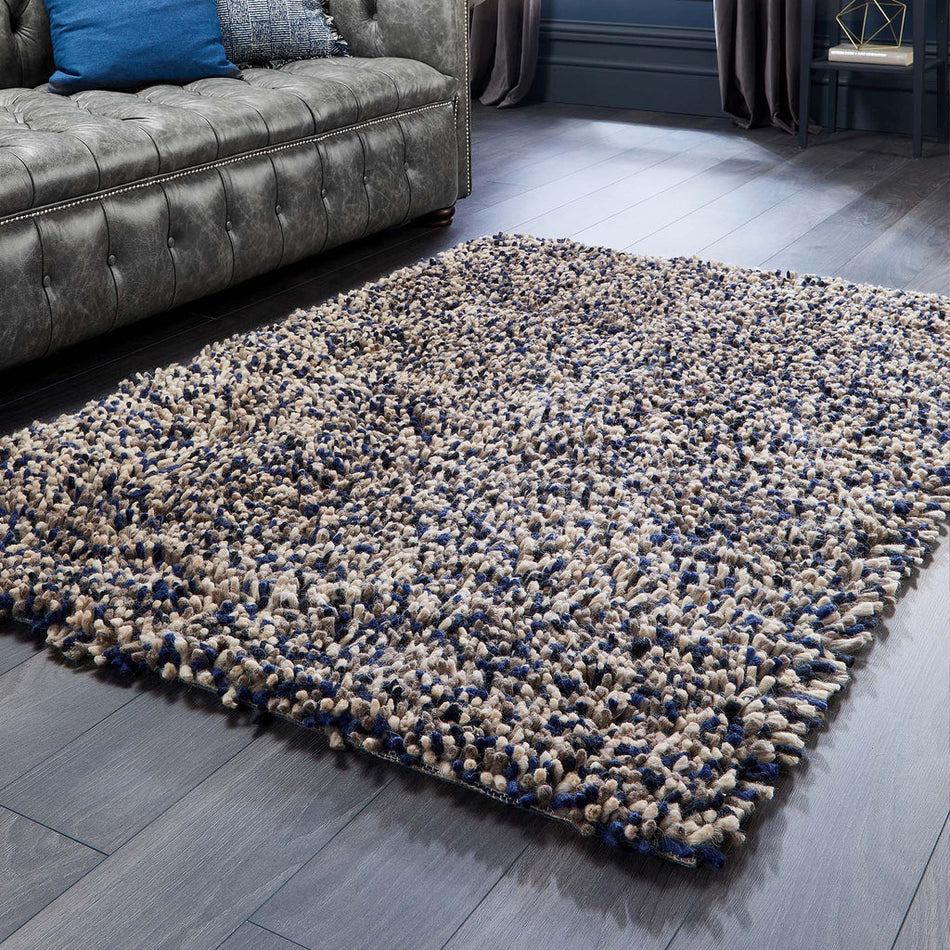 Multi-yarn navy shaggy rug from Origins