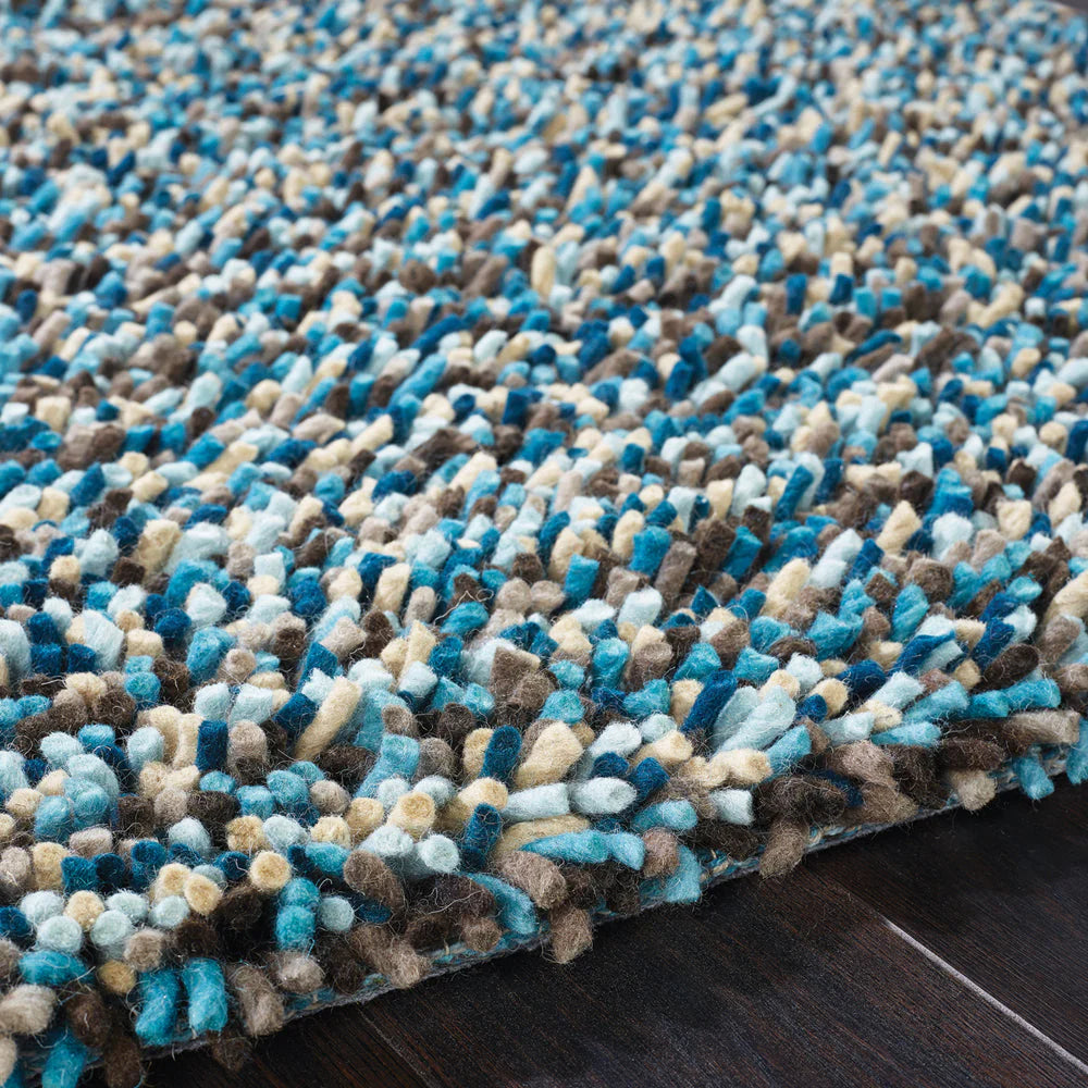 Close-up of shaggy wool texture in Origins Blue rug