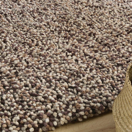 Hand woven shaggy rug in natural colour blend
