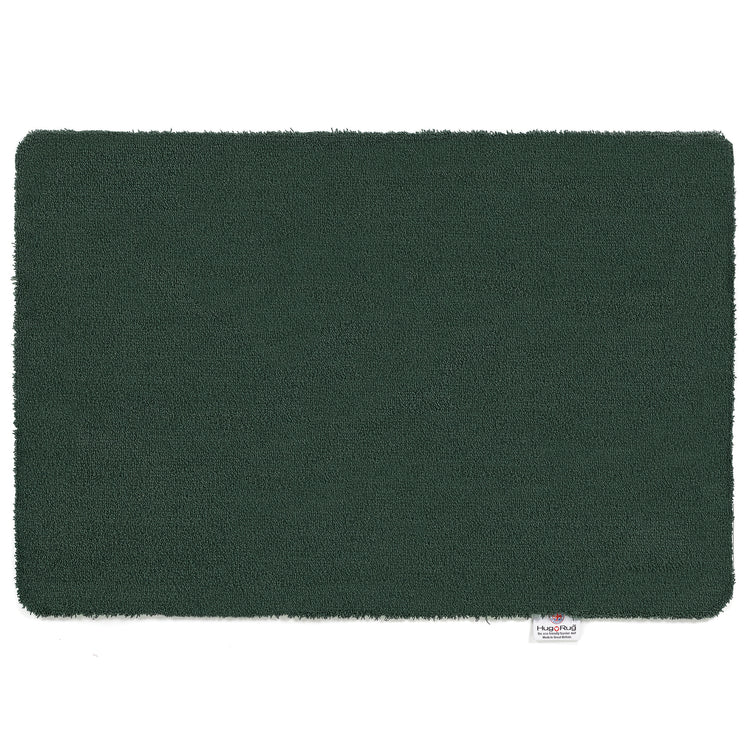 Hug Rug Sense Bath Mat in Forest Green displayed in a modern bathroom

