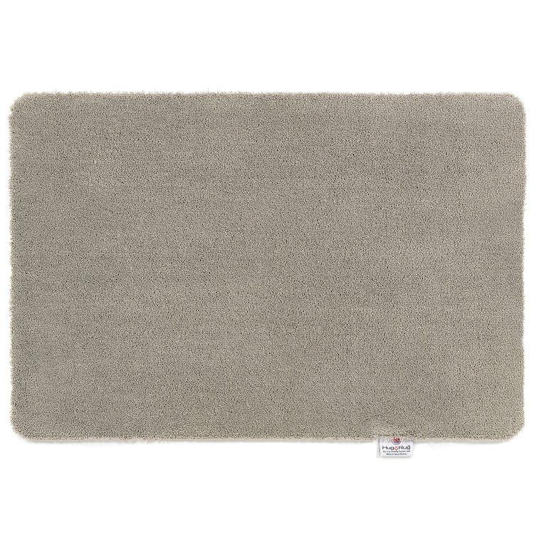 Hug Rug Sense Bath Mat in Ghost Grey displayed in a modern bathroom

