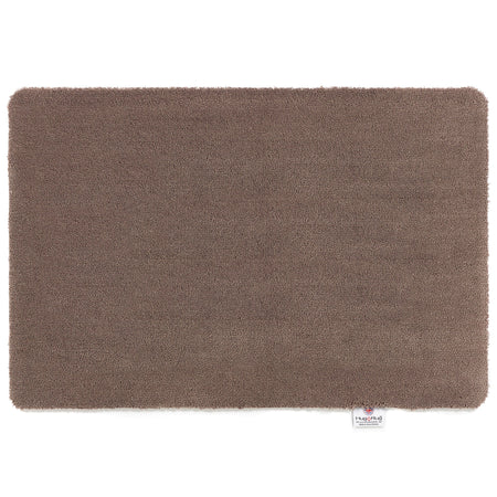 Hug Rug Sense Bath Mat in Mink displayed in a modern bathroom

