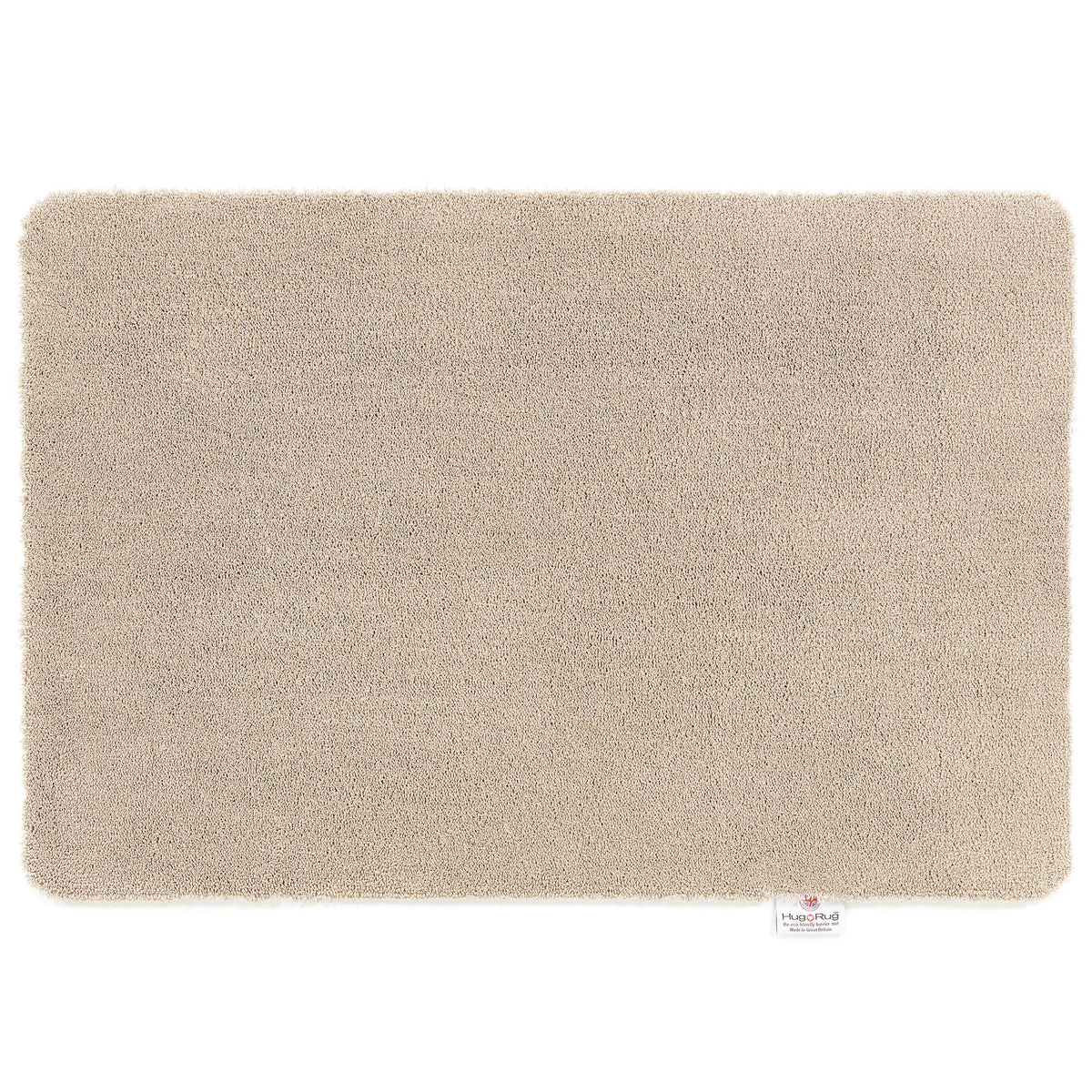 Hug Rug Sense Bath Mat in Beige displayed in a modern bathroom

