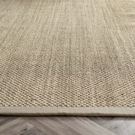 Close-up of sisal Light Beige with Sand Border rug texture with sand border