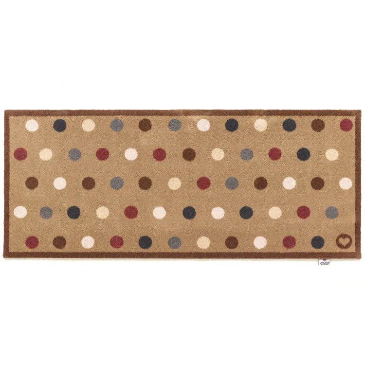 Hug Rug Modern Spot 10 runner with warm toned dots on brown background

