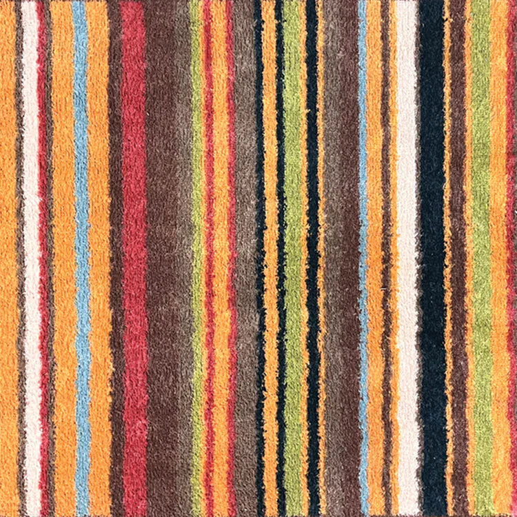 Close-up of Hug Rug Modern Stripe 70’s cotton surface

