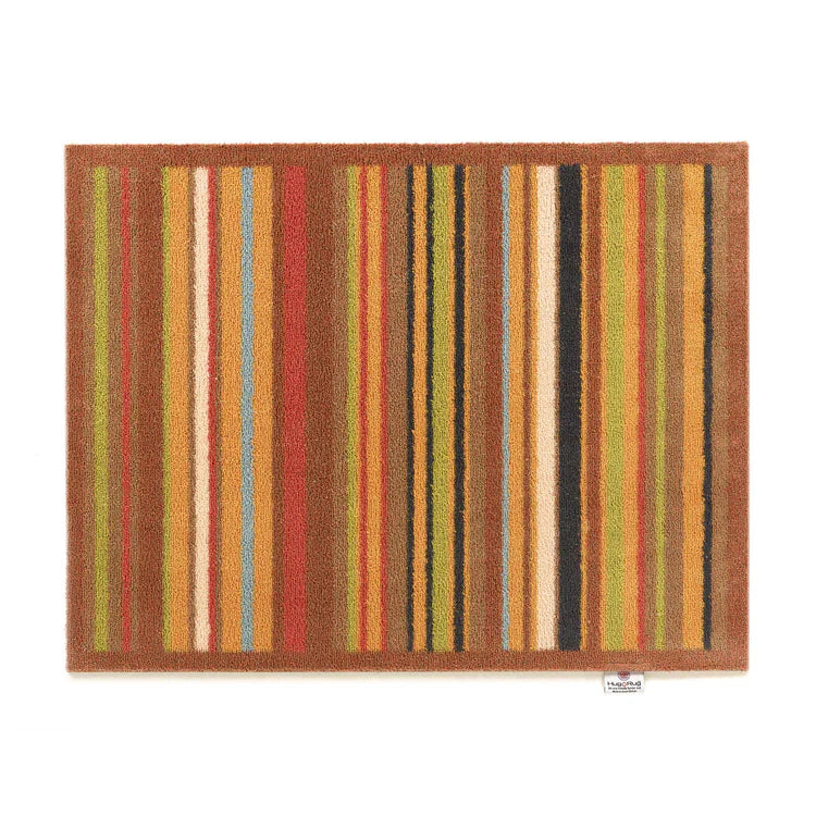 Hug Rug Modern Stripe 70 with earth-tone vertical stripes

