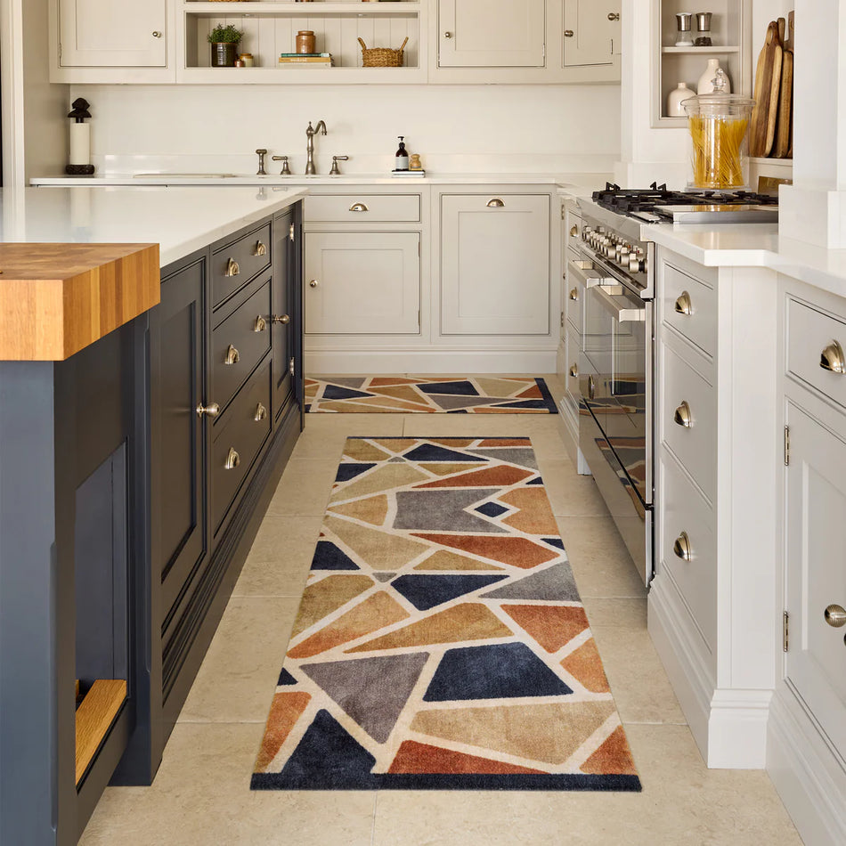 Modern utility space with vibrant mosaic mat