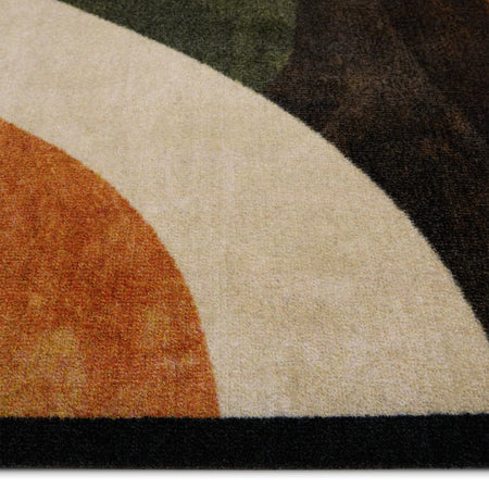 Close-up of a textured surface with geometric patterns in brown, beige, and black.