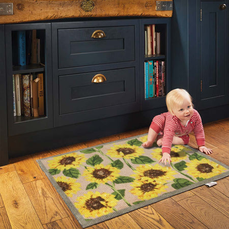 Bright floral Hug Rug on tile or wooden flooring