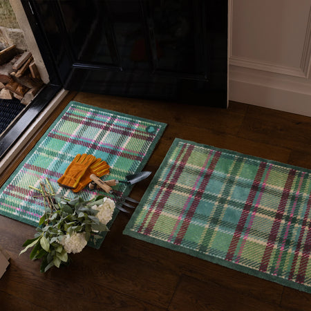 Green tartan Hug Rug perfect for country homes

