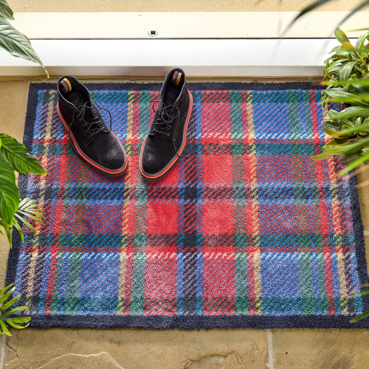 Hug Rug Tartan catching dirt at entrance

