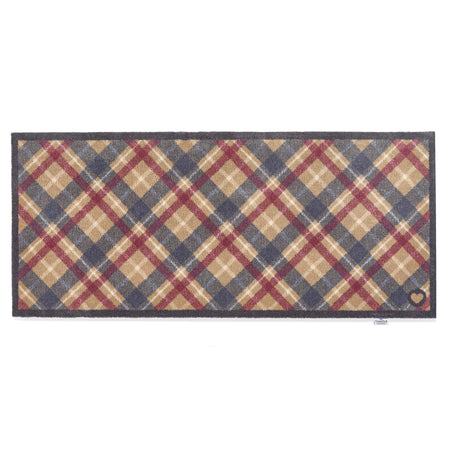 Hug Rug Tartan Paw runner with tartan paw print design on navy background


