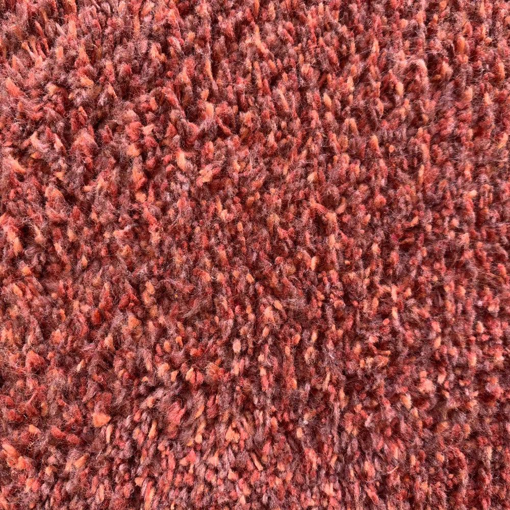 Close-up of Hug Rug terracotta fleck texture

