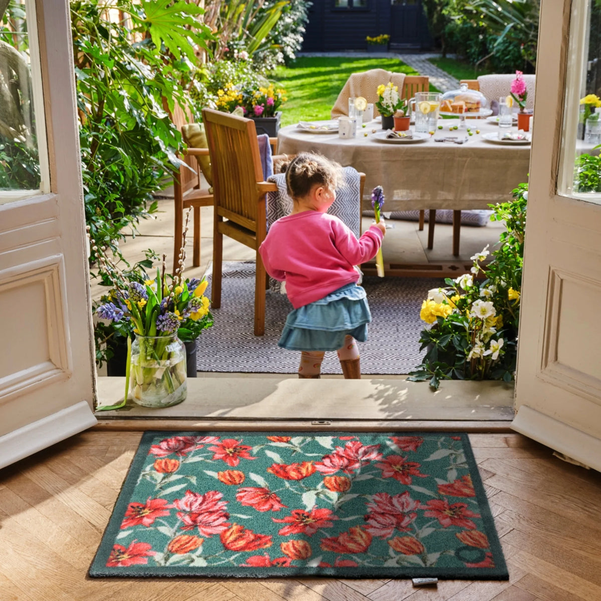 Hug Rug Tumbling Tulips trapping dirt at doorway

