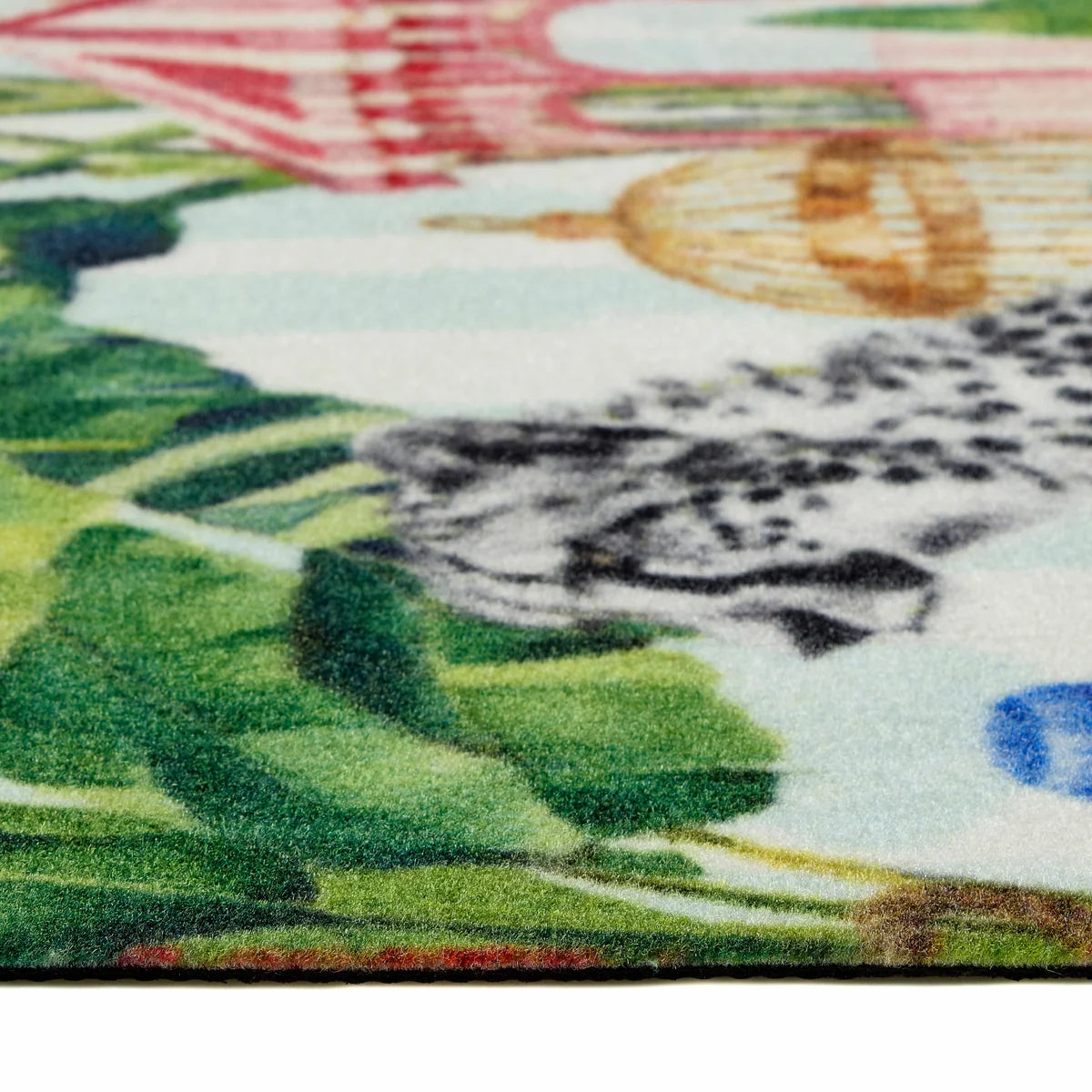 Close-up of Lux Leopard animal print on durable natural coir fibres – Ideal for scraping dirt from shoes