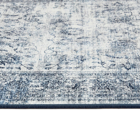 Close-up of a blue and white patterned rug
