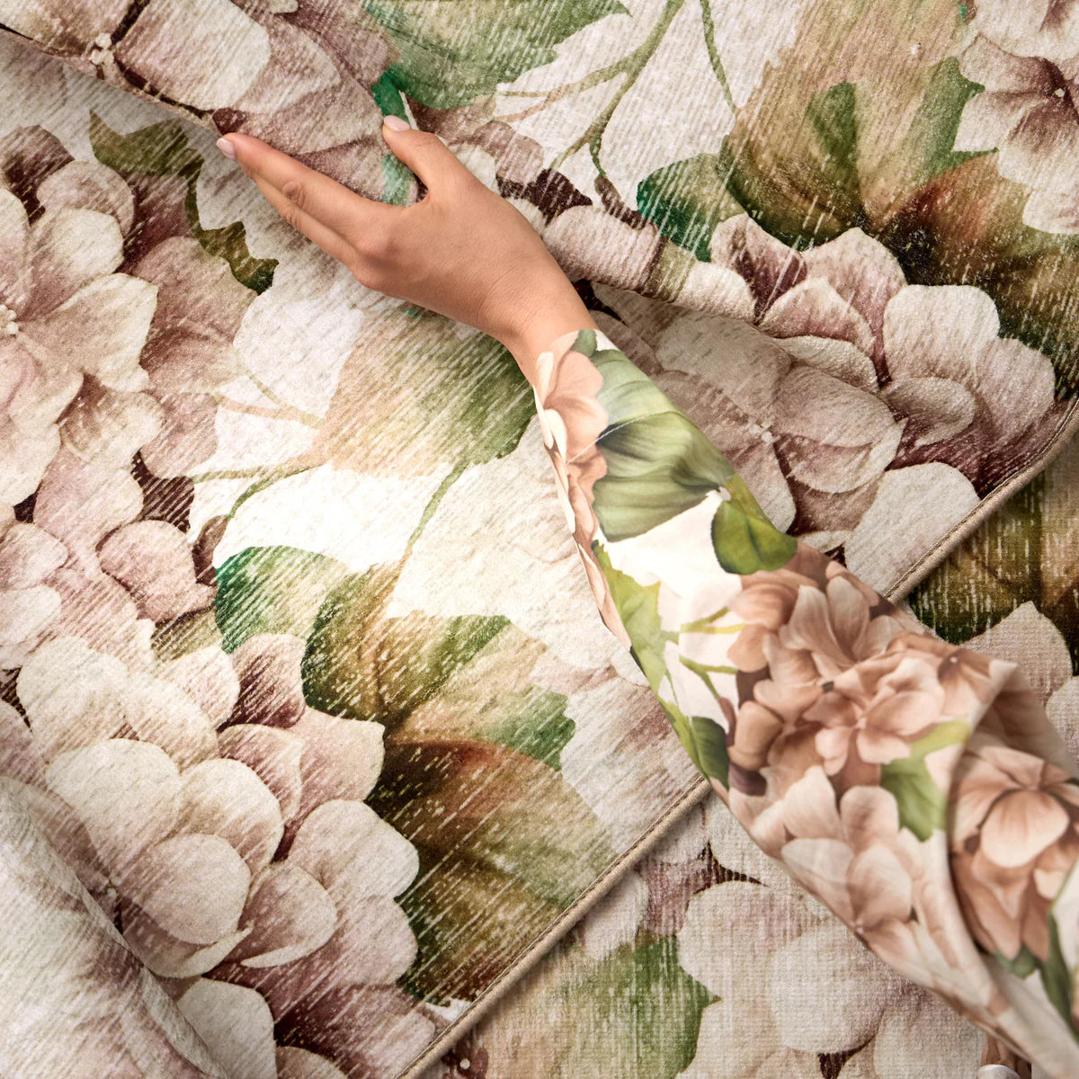 Close-up of rust and beige hydrangea blooms on Hug Rug

