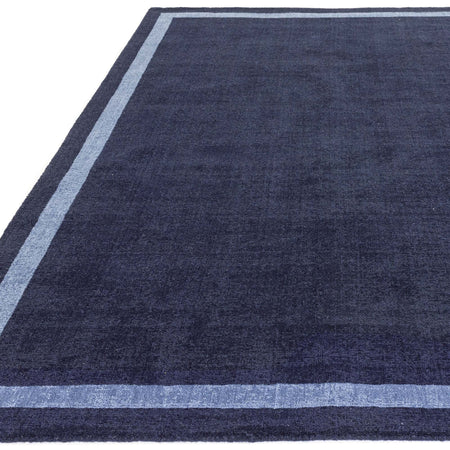 Handwoven wool rug in moody navy

