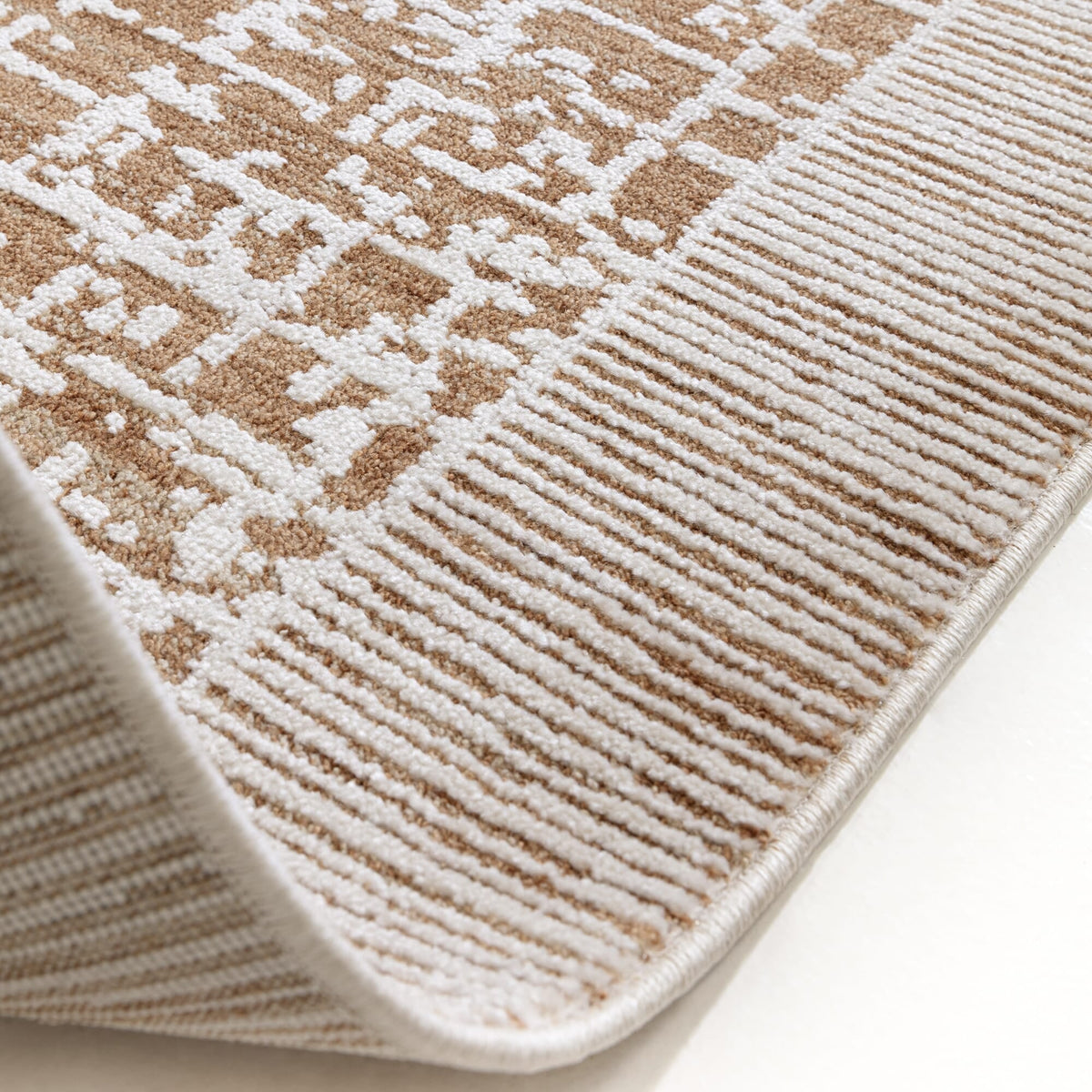 Asiatic rug styled with minimalist furniture

