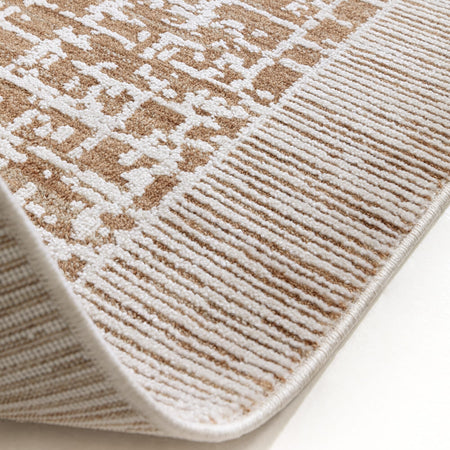 Asiatic rug styled with minimalist furniture

