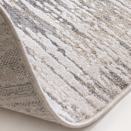 Machine woven rug with faded geometric look

