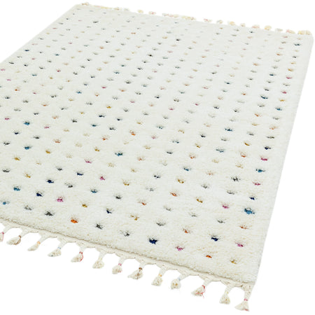 High pile textured rug with tassel edge

