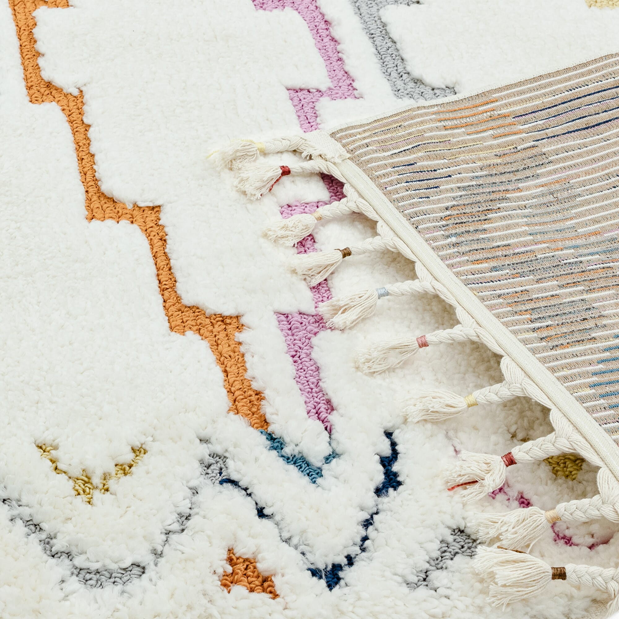 Thick Moroccan-style rug in neutral tone

