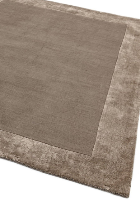 Hand woven taupe border rug

