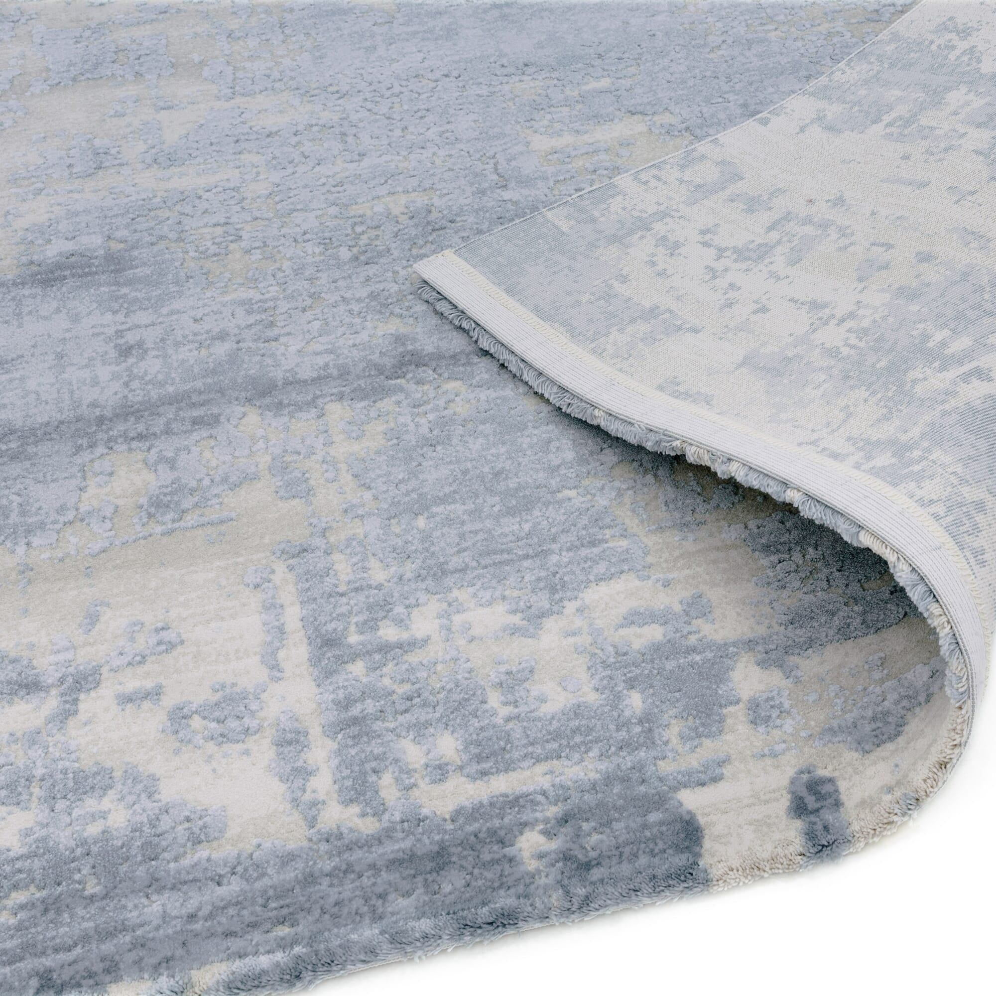 Close-up of Astral AS04 rug texture and showing backing of rug