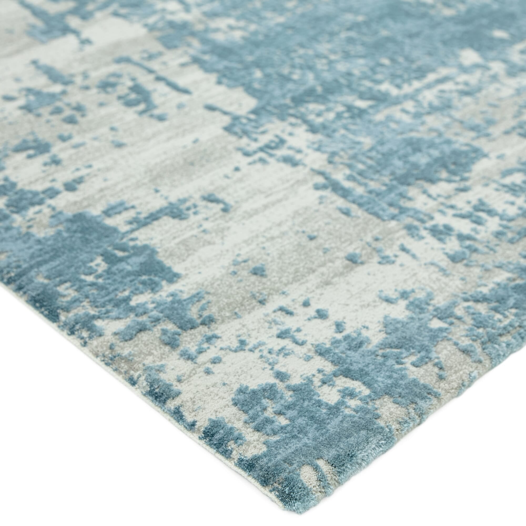 Contemporary rug with distressed blue finish

