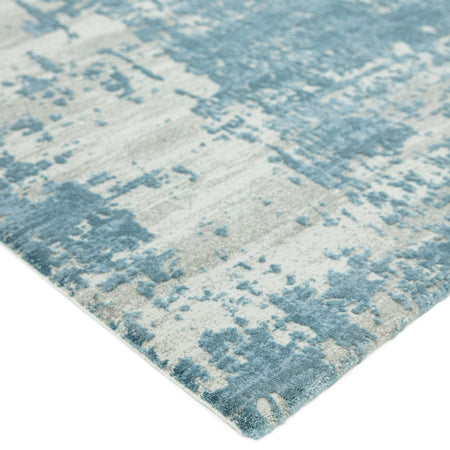 Contemporary rug with distressed blue finish

