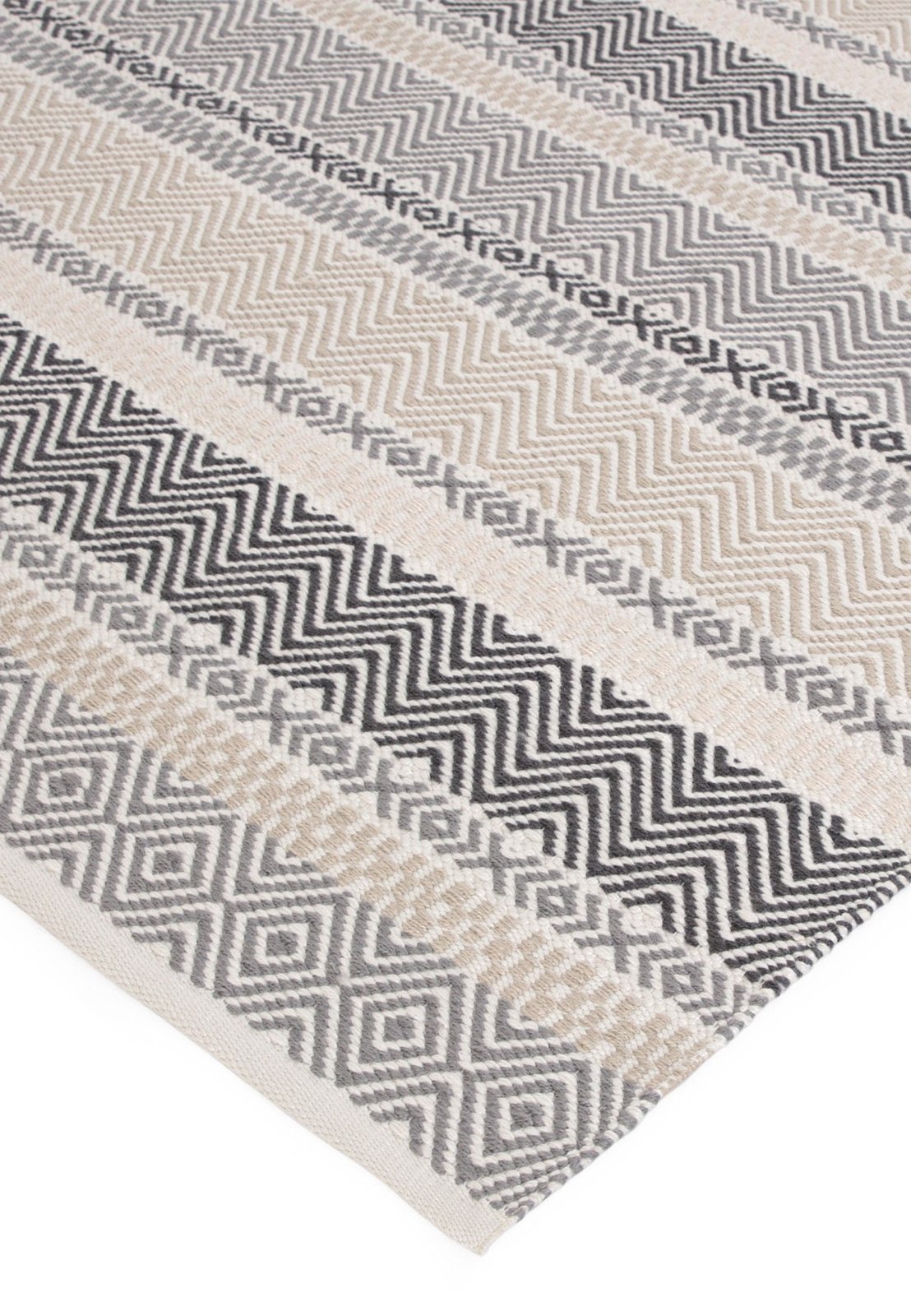 Grey and ivory stripe outdoor rug on patio

