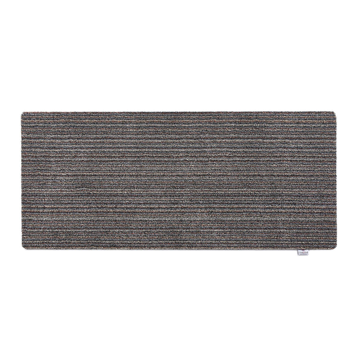 Rectangular gray doormat on a white background