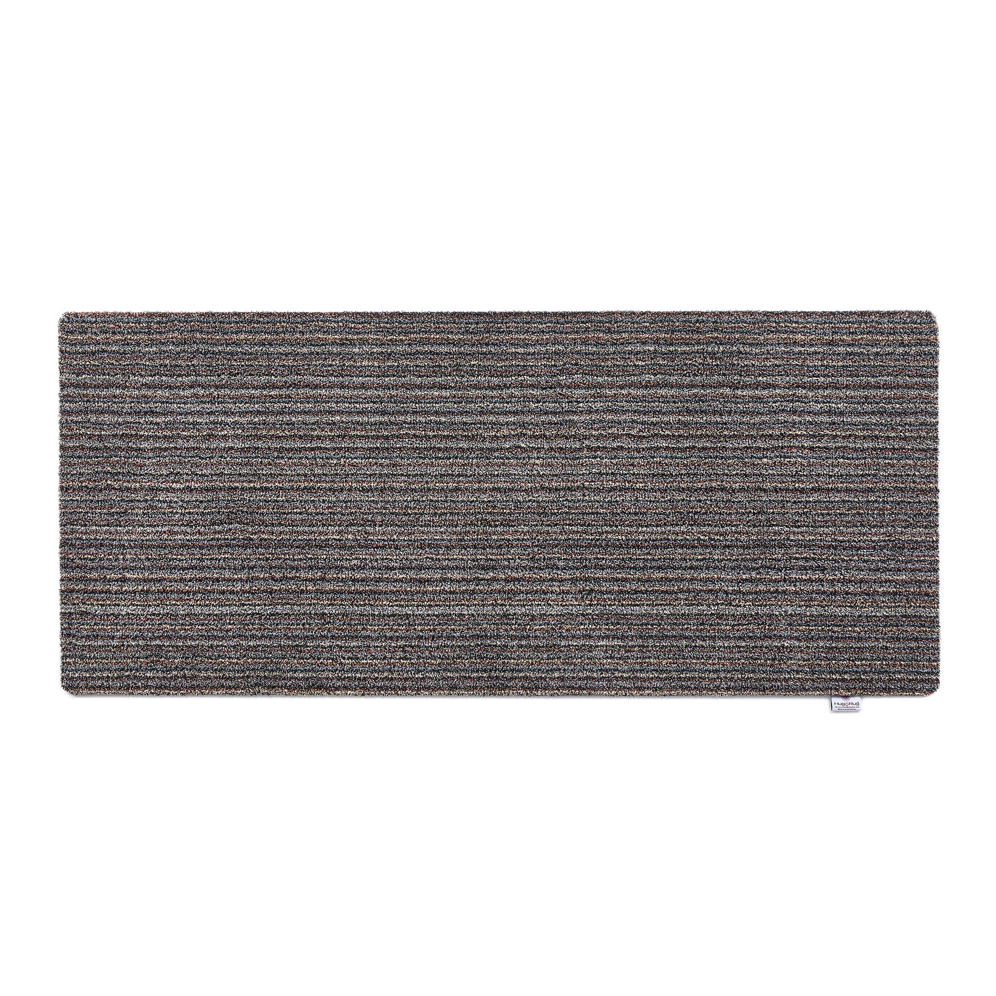 Rectangular gray doormat on a white background