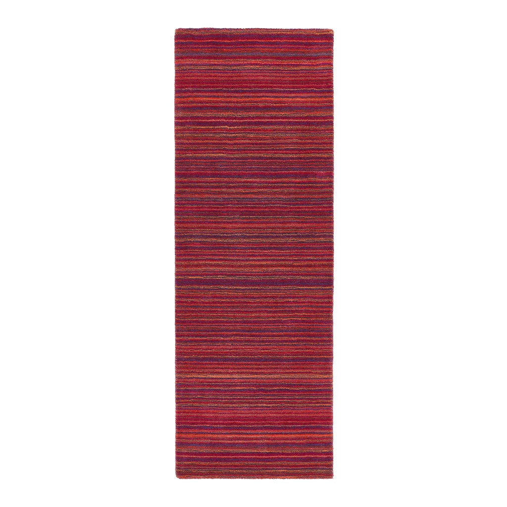 Origins purple/pink striped rug on a white background