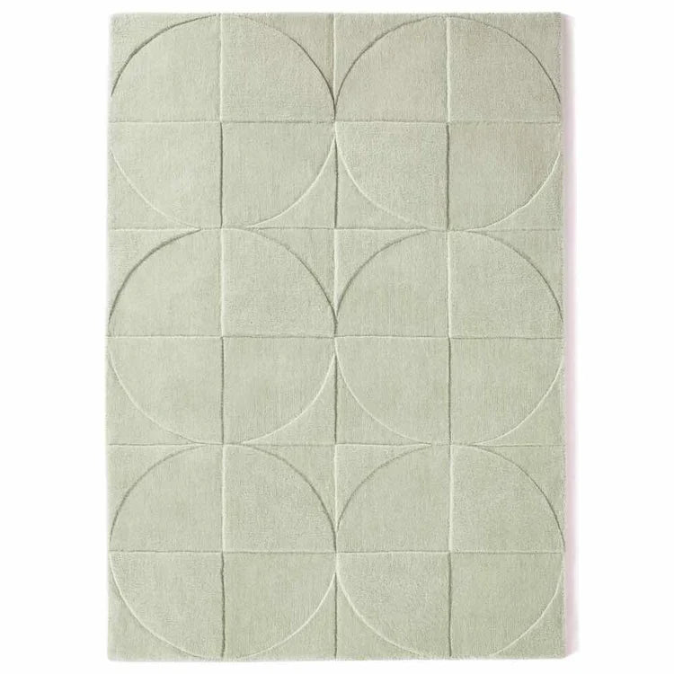 Origins Penny Rug Eucalyptus green wool rug on white background