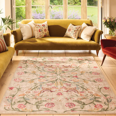 Vintage-style washable rug in cream and rust tones

