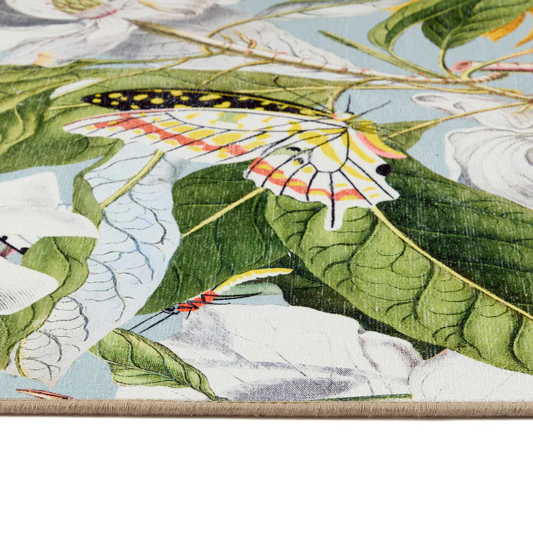 Close-up of a fabric panel with butterfly and leaf design