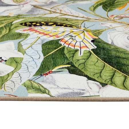 Close-up of a fabric panel with butterfly and leaf design