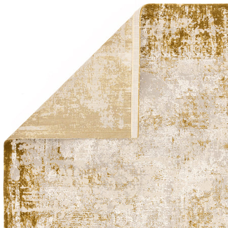 Polypropylene polyester gold rug close-up

