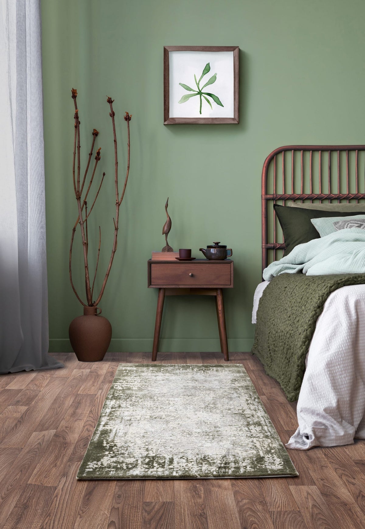Asiatic Kuza Border Green Rug in bedroom