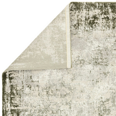 Green rug with subtle border by Asiatic

