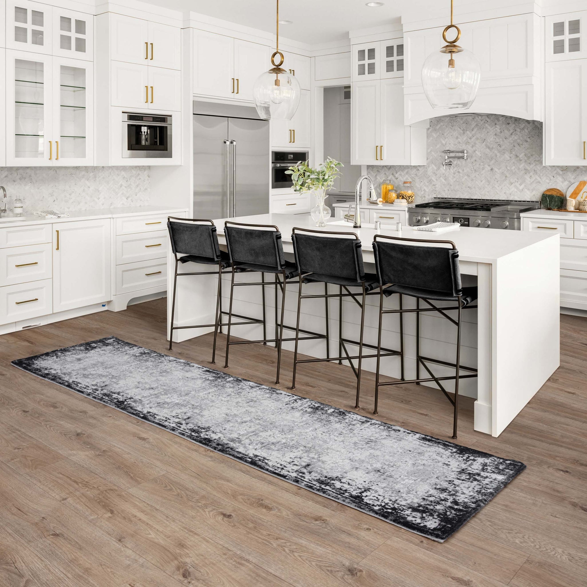 Kuza Border collection grey rug styled in kitchen