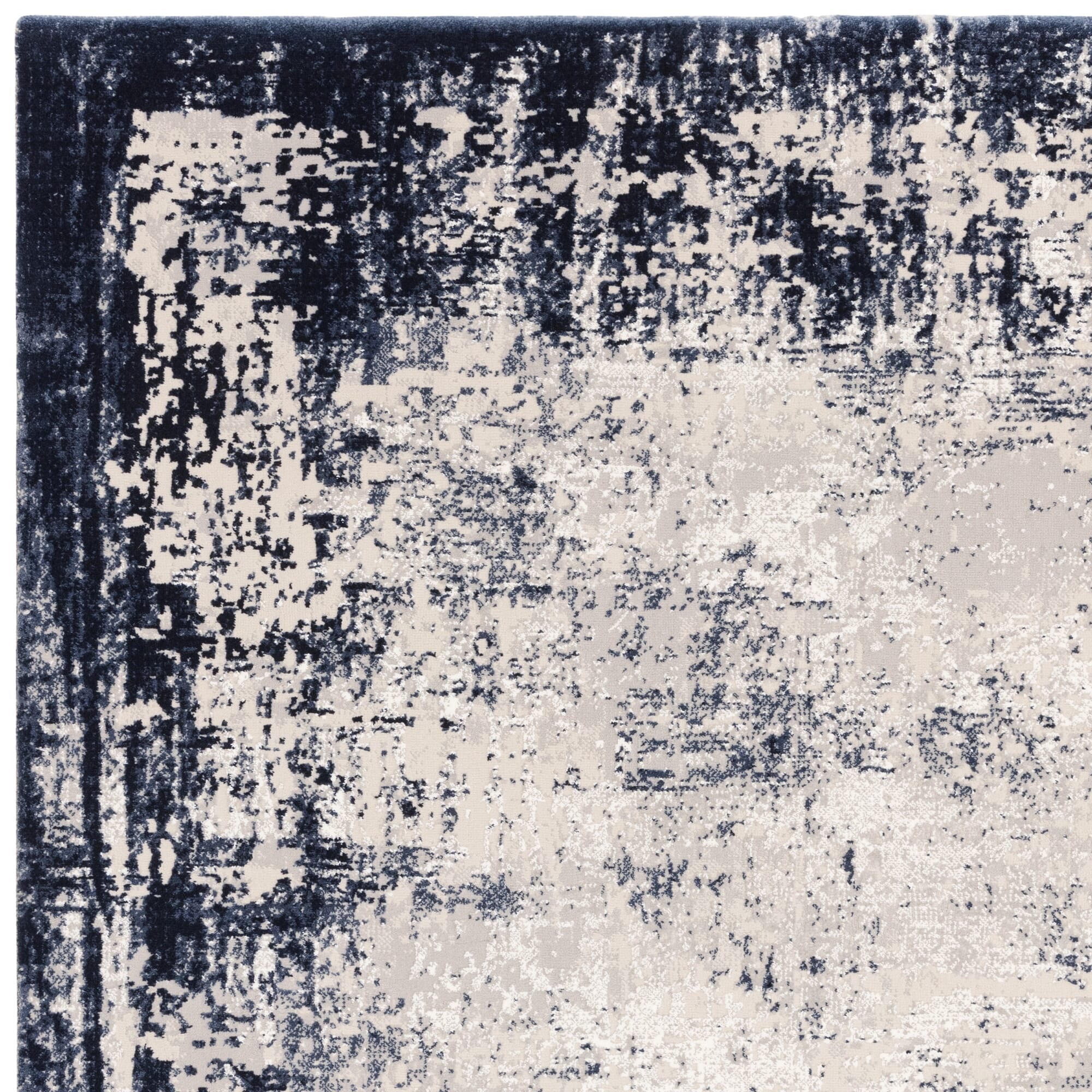 Close-up of velvety navy rug texture

