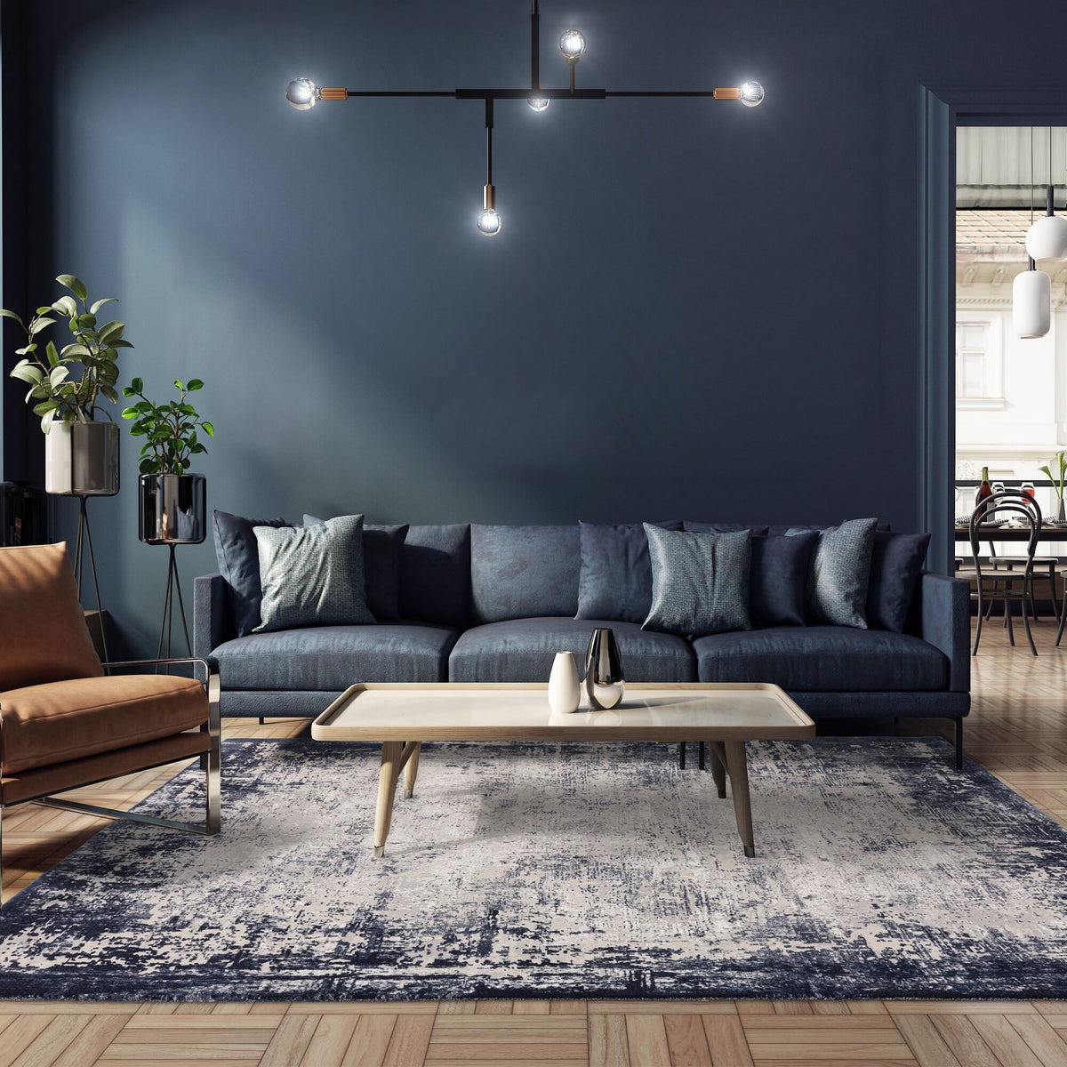 Jewel-tone navy rug styled in modern interior

